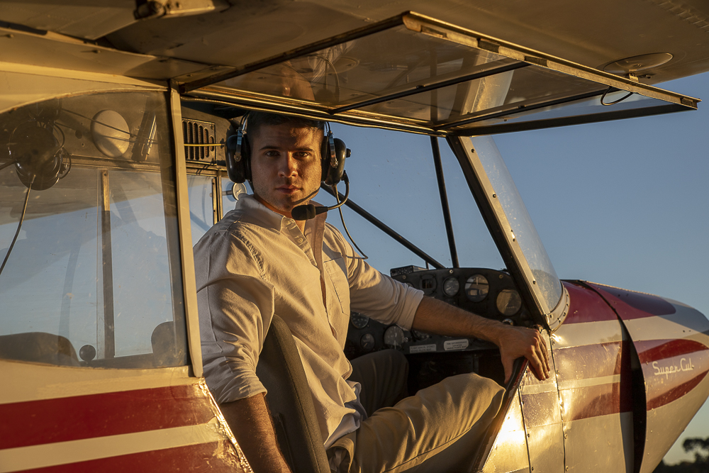 Portraiture of a man in a light aircraft
