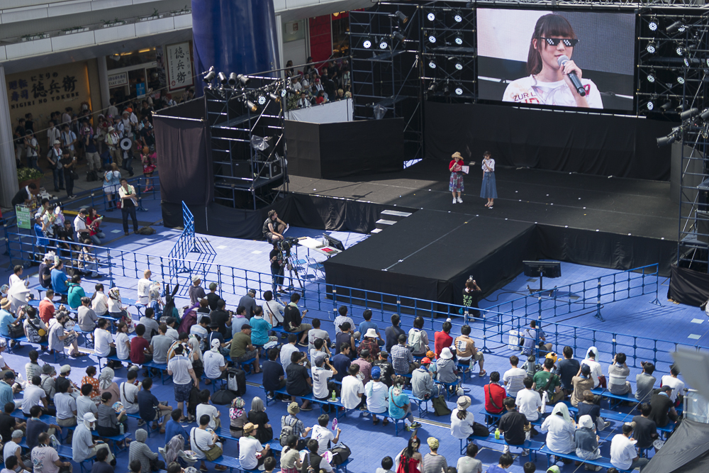 Audience and stage at major media event in Japan