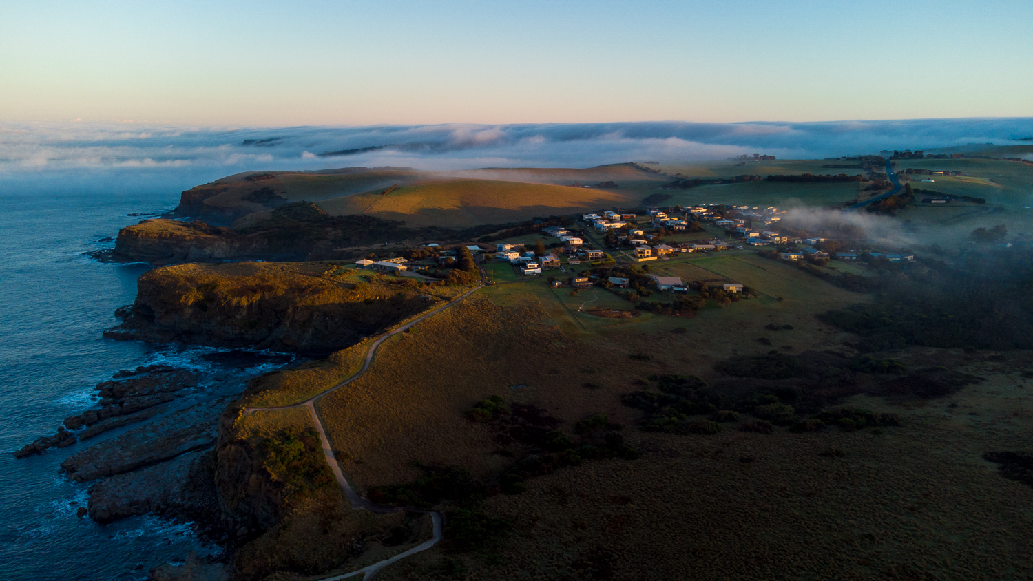 A scenic sunrise of a coastal town in Victoria. Photo taken from drone.